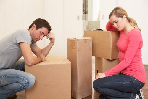 Person moving a box carefully using safe manual handling