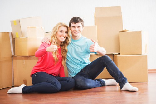 Camden small removals team moving furniture through urban streets