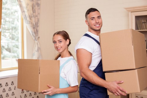 Packed boxes and removal van for Camden house move