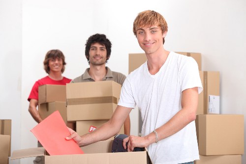 Professional movers handling furniture for a Camden relocation